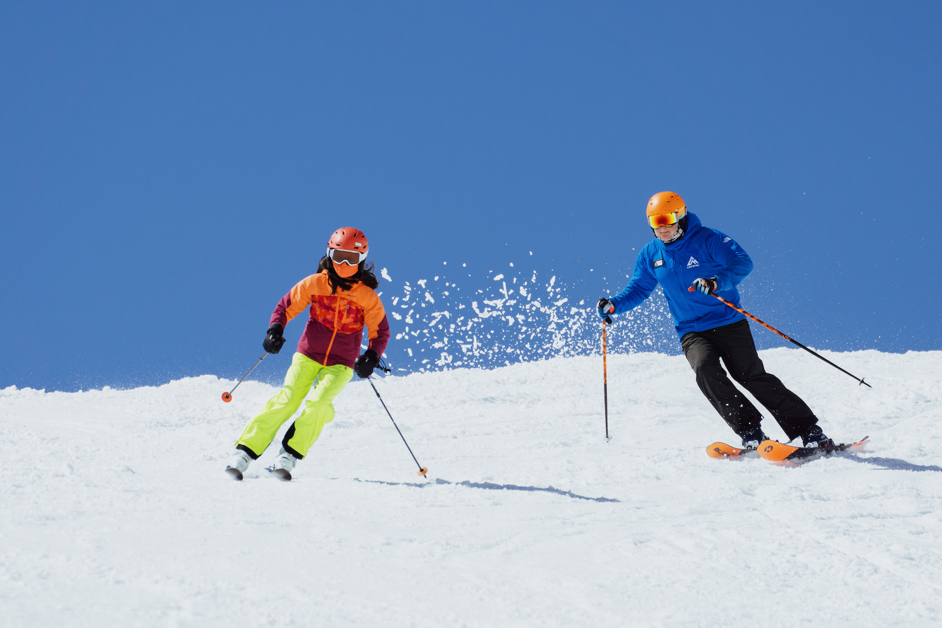 Private Lesson instructor and student turn well on a bluebird day