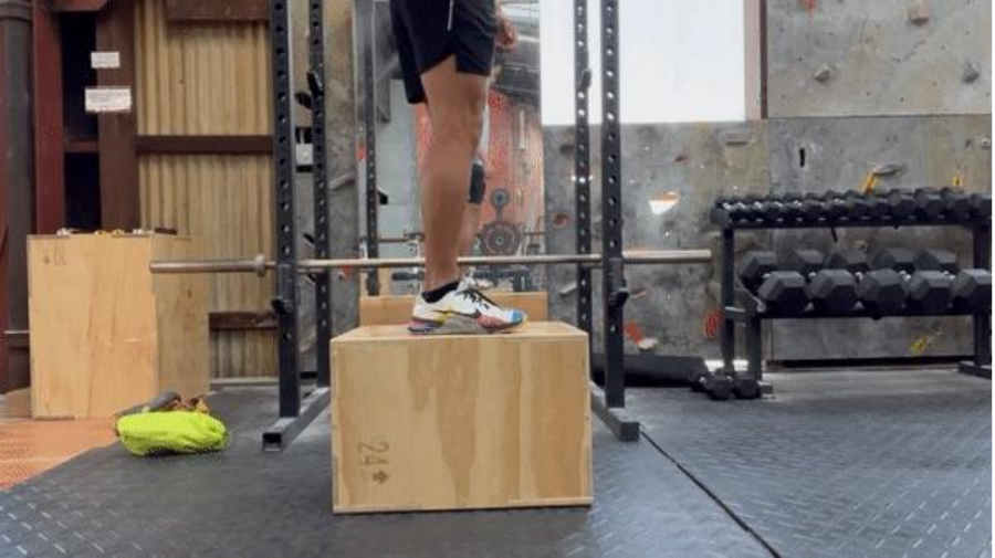 A person standing on a box