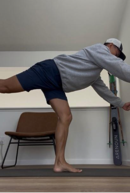 A person standing on a ledge