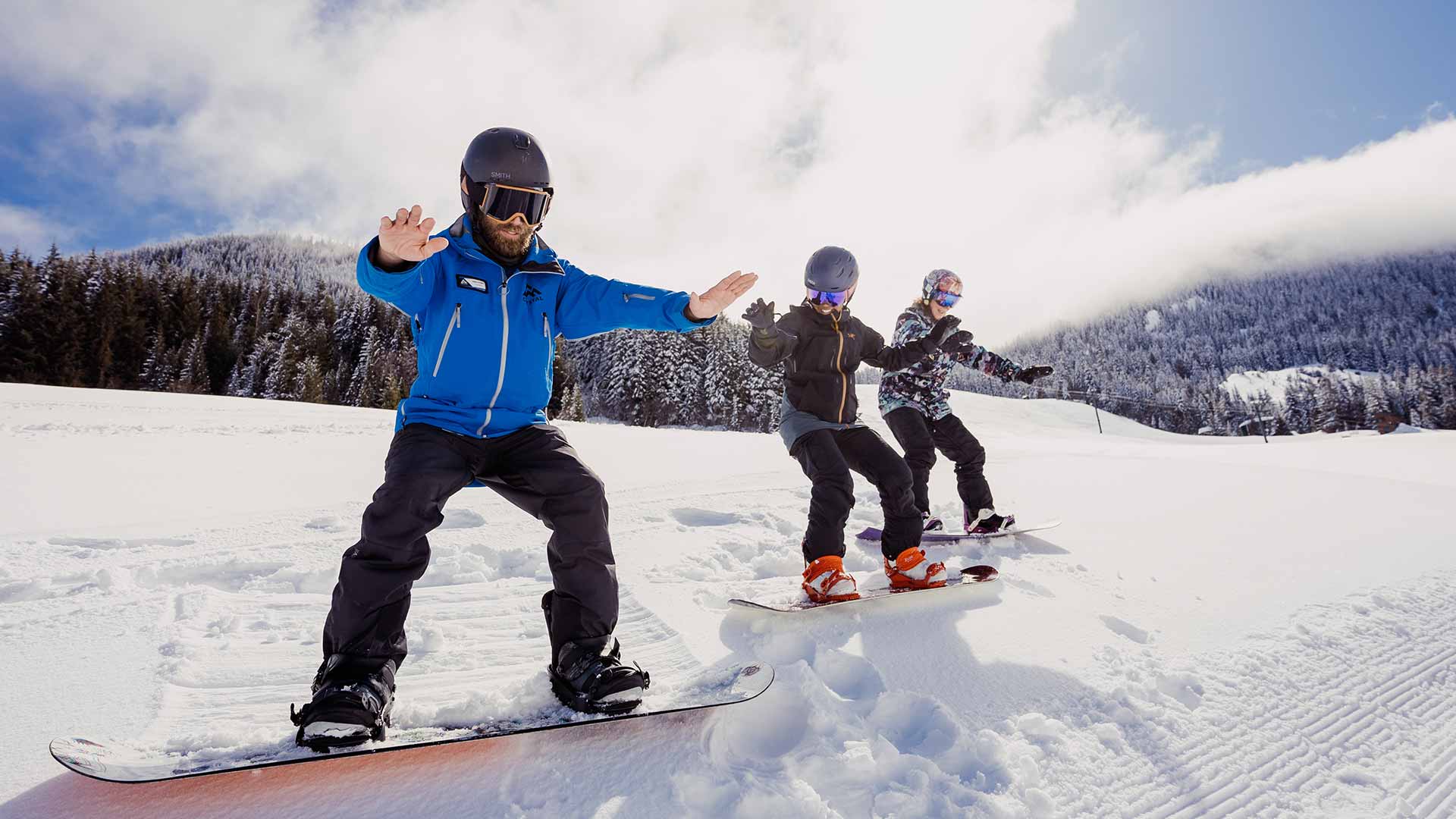 Kids building their skiing and snowboarding skills at Crystal Mountain